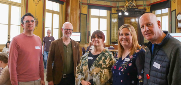 five cllrs stood together smiling