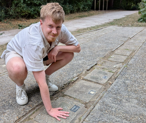 Bradley Atkinson with his handprint
